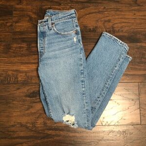 Levi’s 501 in women’s jeans. 24X30 and fit me snug at 5’0 and 100 lbs.